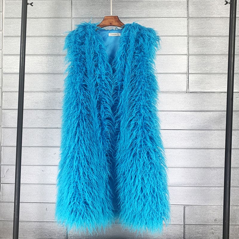 Bright blue fluffy sleeveless vest hanging on a wooden hanger.