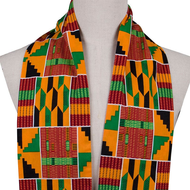 Colorful patterned scarf with African-inspired geometric designs in orange, green, red, and black.