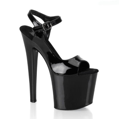 Black patent leather platform high heel sandal with an ankle strap.