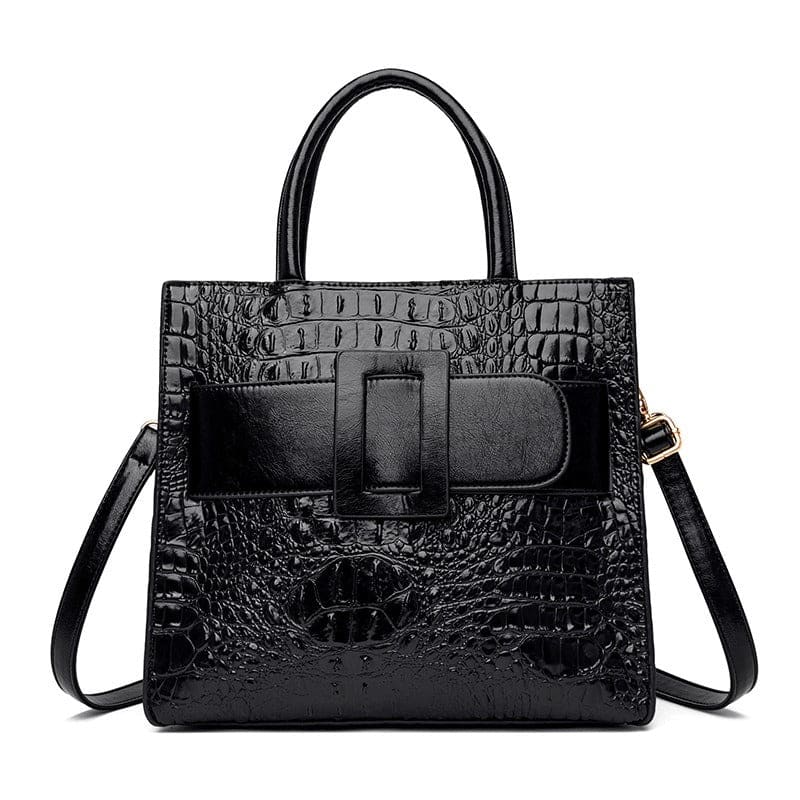 Black crocodile-textured handbag with a prominent front buckle and shoulder strap.