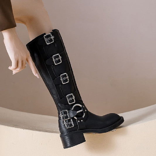 Black knee-high boot with multiple buckle straps and a chunky heel.