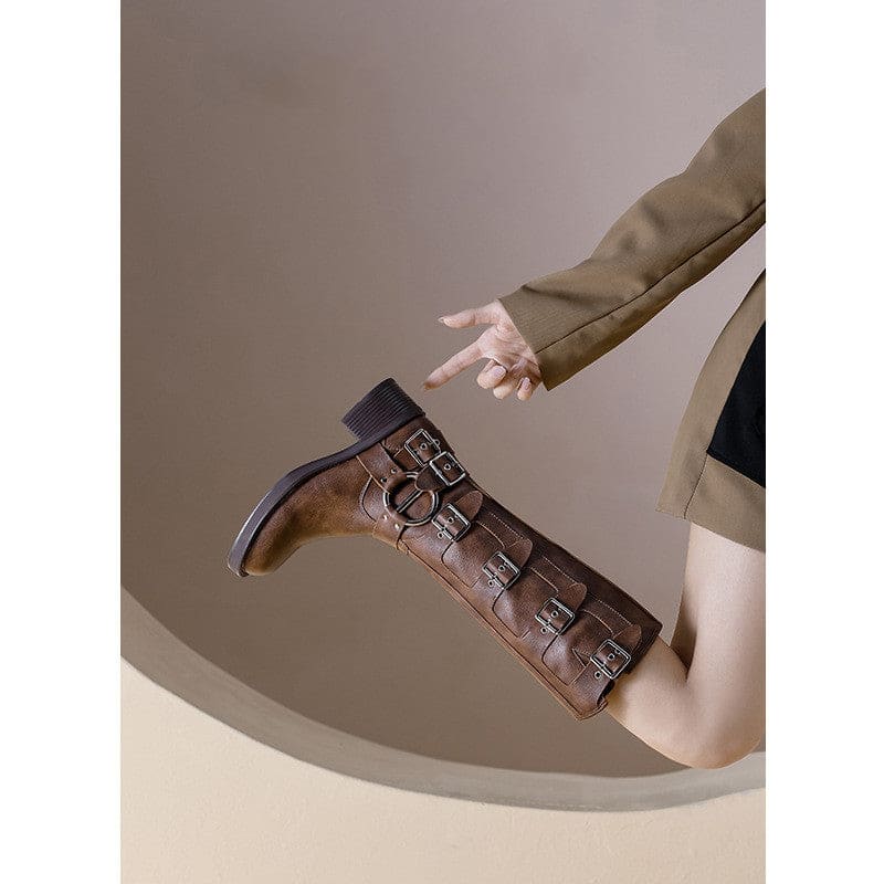 Brown leather knee-high boot with buckle details.