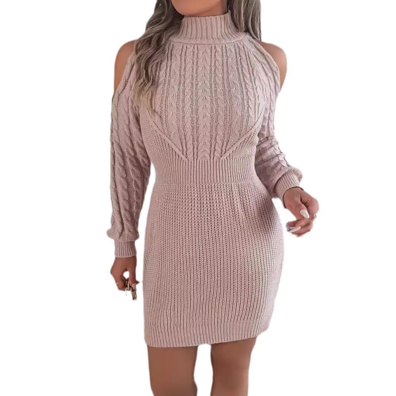 Pink knitted cold-shoulder sweater dress with a turtleneck and cable pattern.