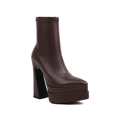 Brown leather platform ankle boot with a chunky high heel.