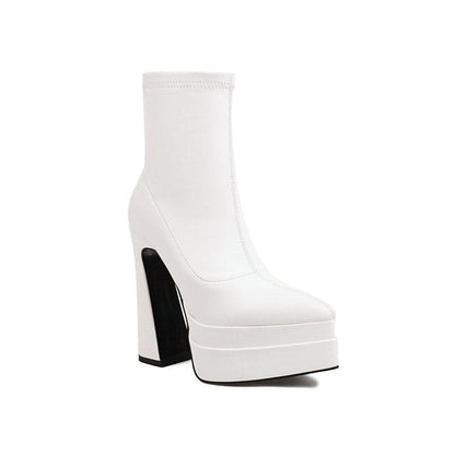 White platform ankle boot with a chunky heel.