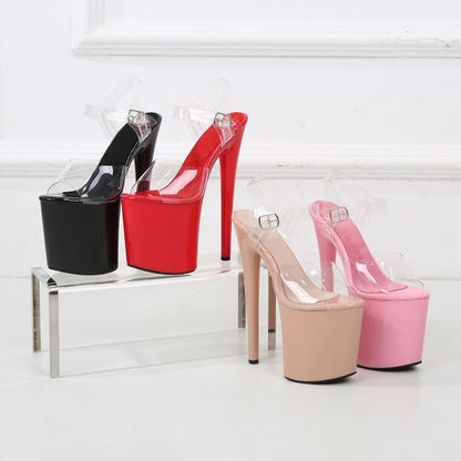 Four pairs of extremely high platform stiletto heels in black, red, beige, and pink colors.